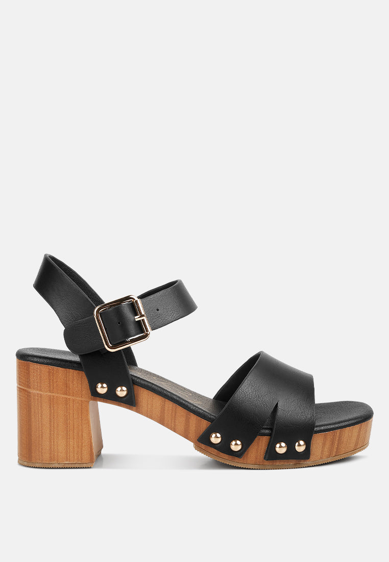 Campbell Faux Leather Textured Block Heel Sandals featuring a stylish design with a textured block heel and stud details.