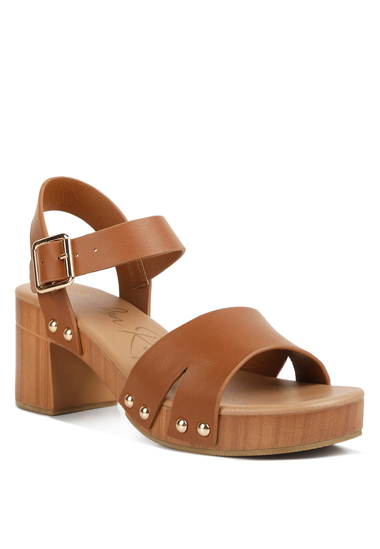 Campbell Faux Leather Textured Block Heel Sandals featuring a stylish design with a textured block heel and stud details.