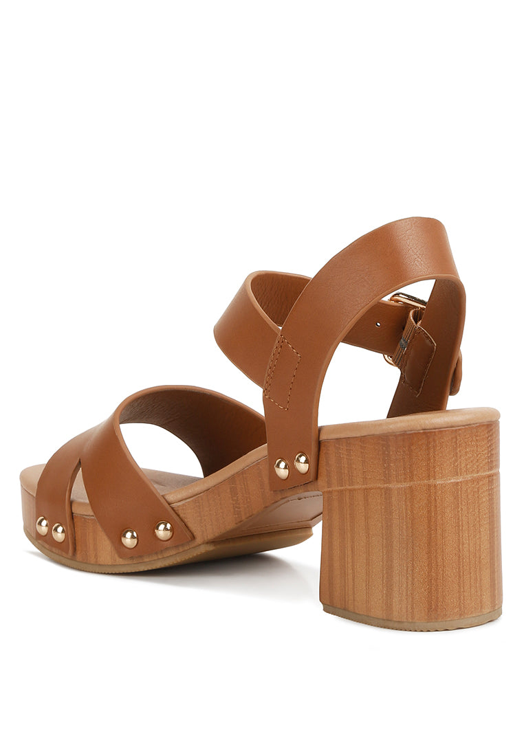 Campbell Faux Leather Textured Block Heel Sandals featuring a stylish design with a textured block heel and stud details.