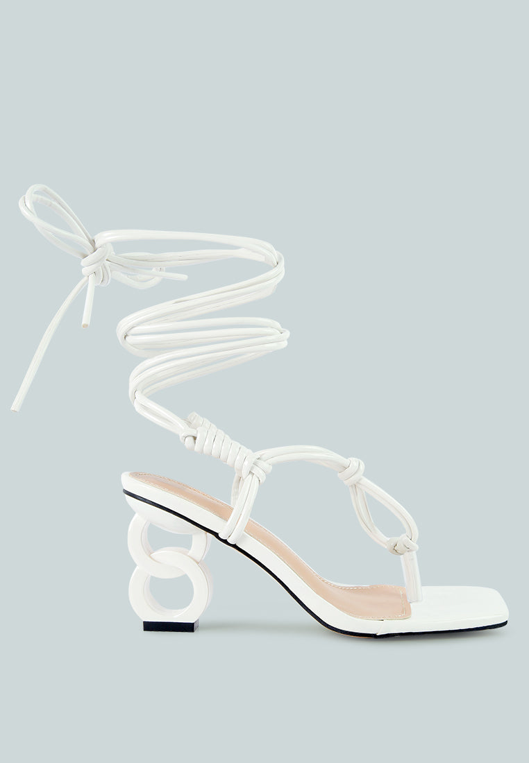 Cassino Strappy Lace Up Sandals featuring chain heels and a stylish lace-up design in faux leather.