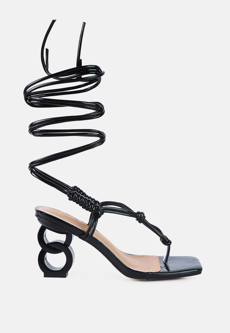 Cassino Strappy Lace Up Sandals featuring chain heels and a stylish lace-up design in faux leather.