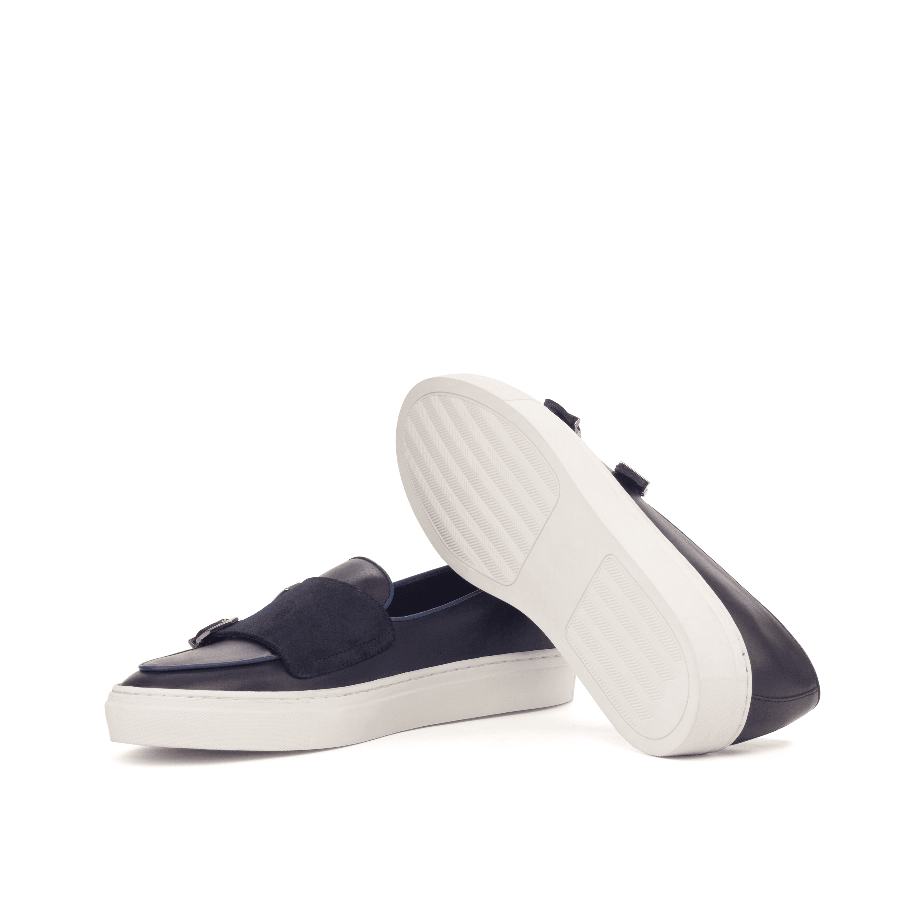 Celsus Monk Sneaker II featuring a double monk strap design with a white and black cupsole, crafted from premium navy and black leather materials.