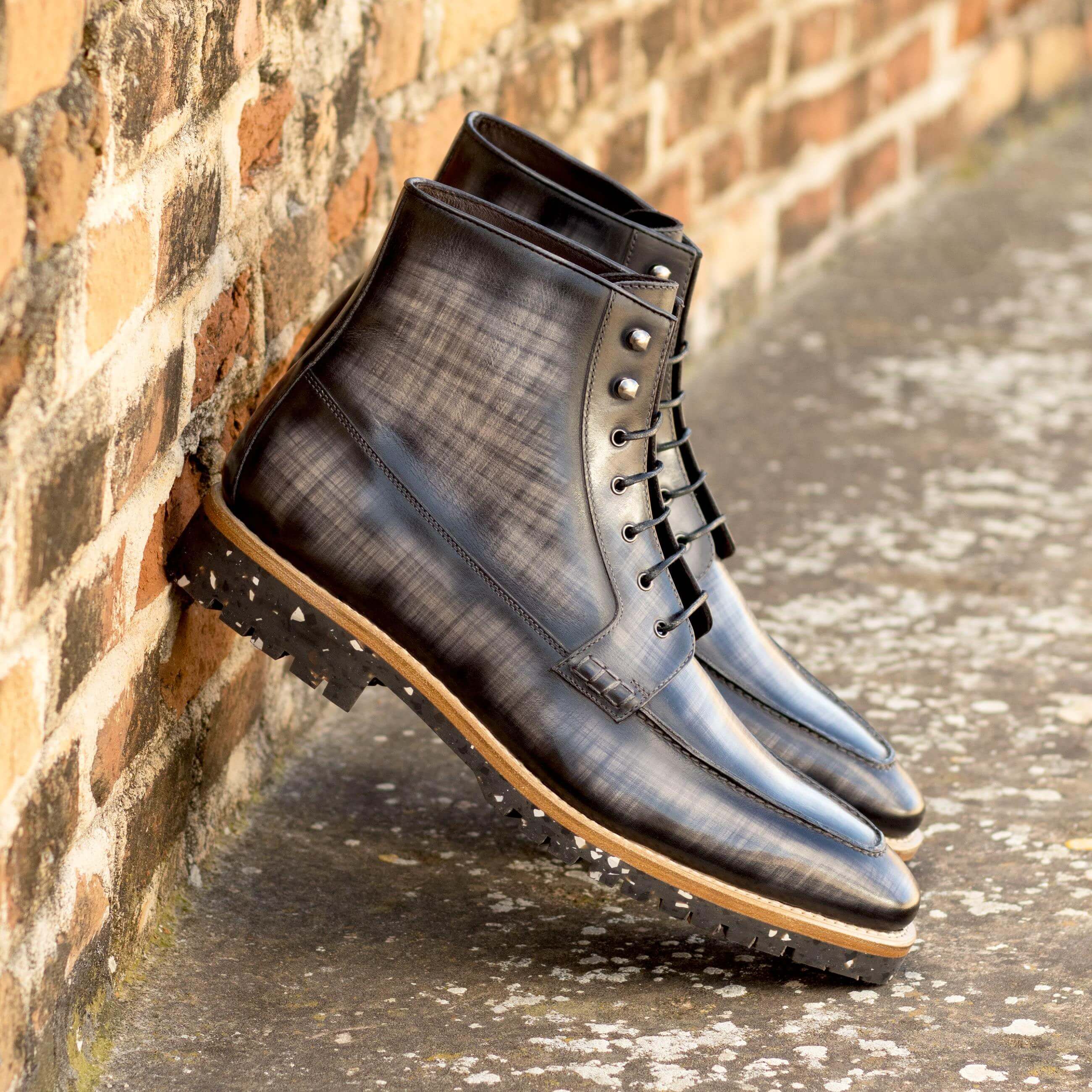 CEO Patina Moc Boots II featuring a vintage lace-up design, grey patina leather, and a sturdy recycled rubber sole.