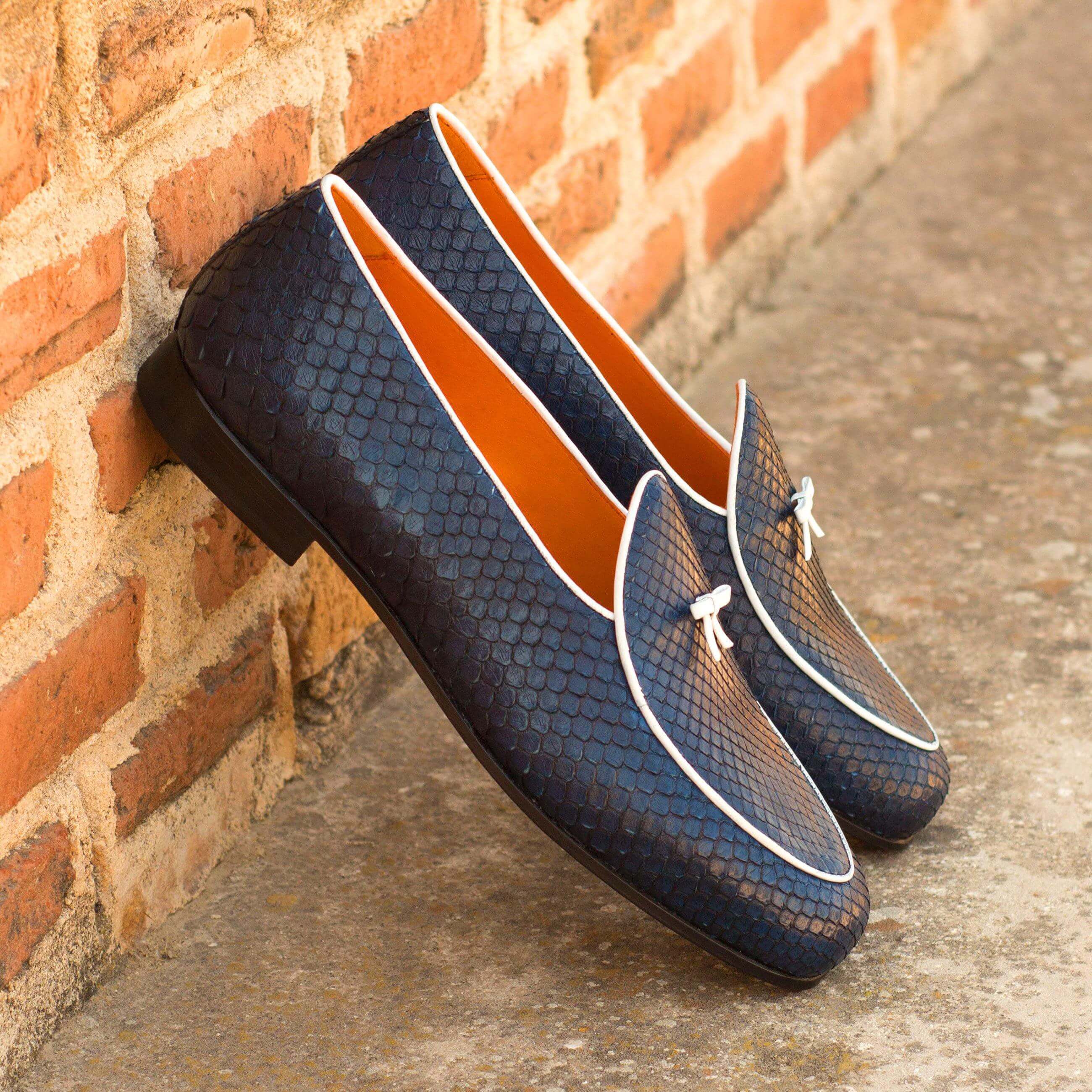 Cina Python Belgian Slipper II featuring navy python leather and orange calf leather lining with a double monk strap design.