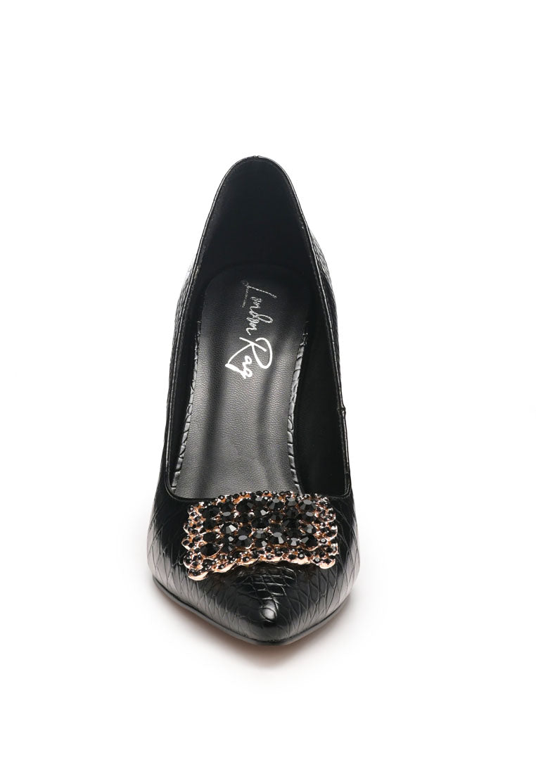 Cirrus Diamante Embellished Brooch Pumps featuring faux leather upper, stiletto heel, and sparkling diamante brooch detail.