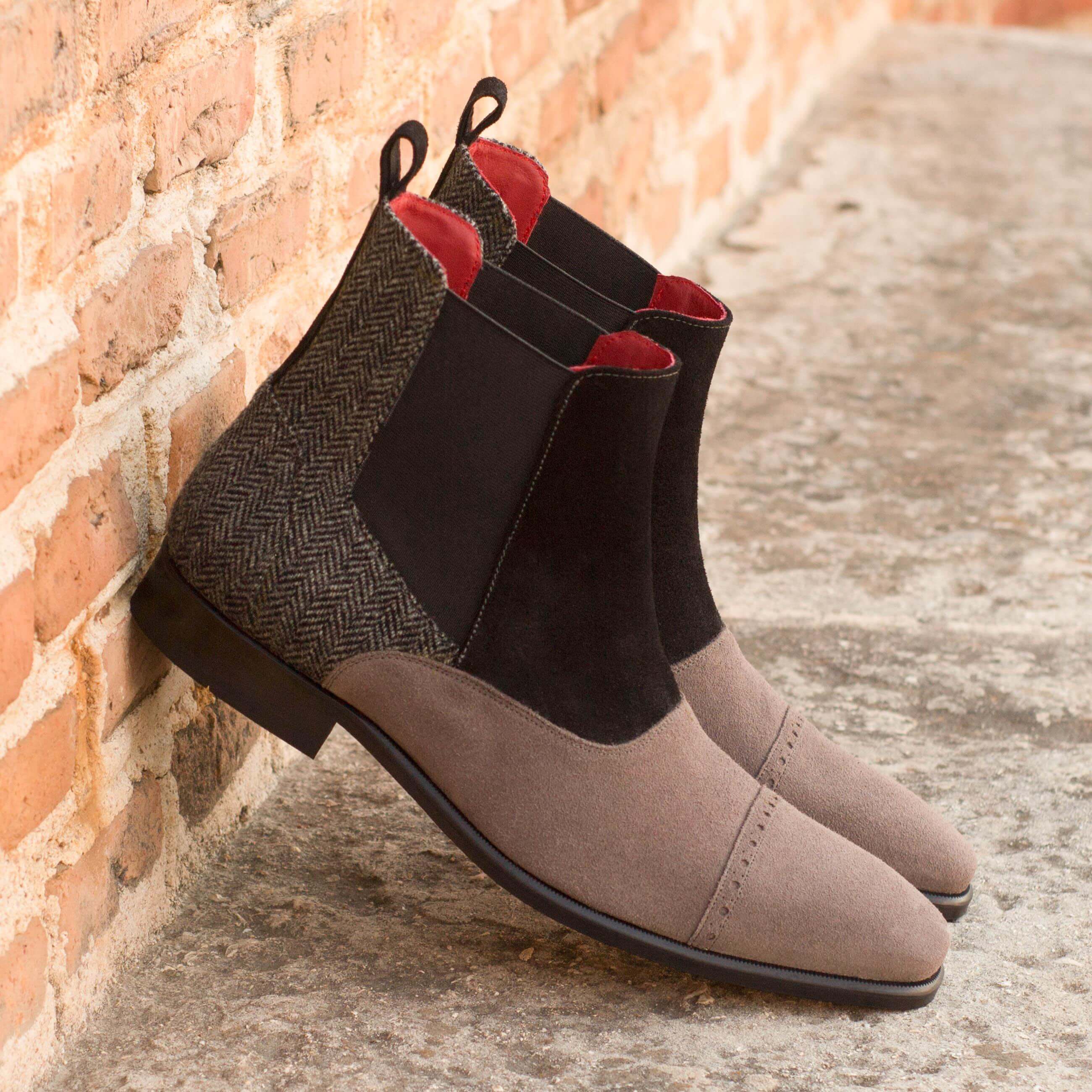 CM20 Chelsea Boots II featuring black and grey suede with a red Goodyear leather sole, showcasing a classic slip-on design.