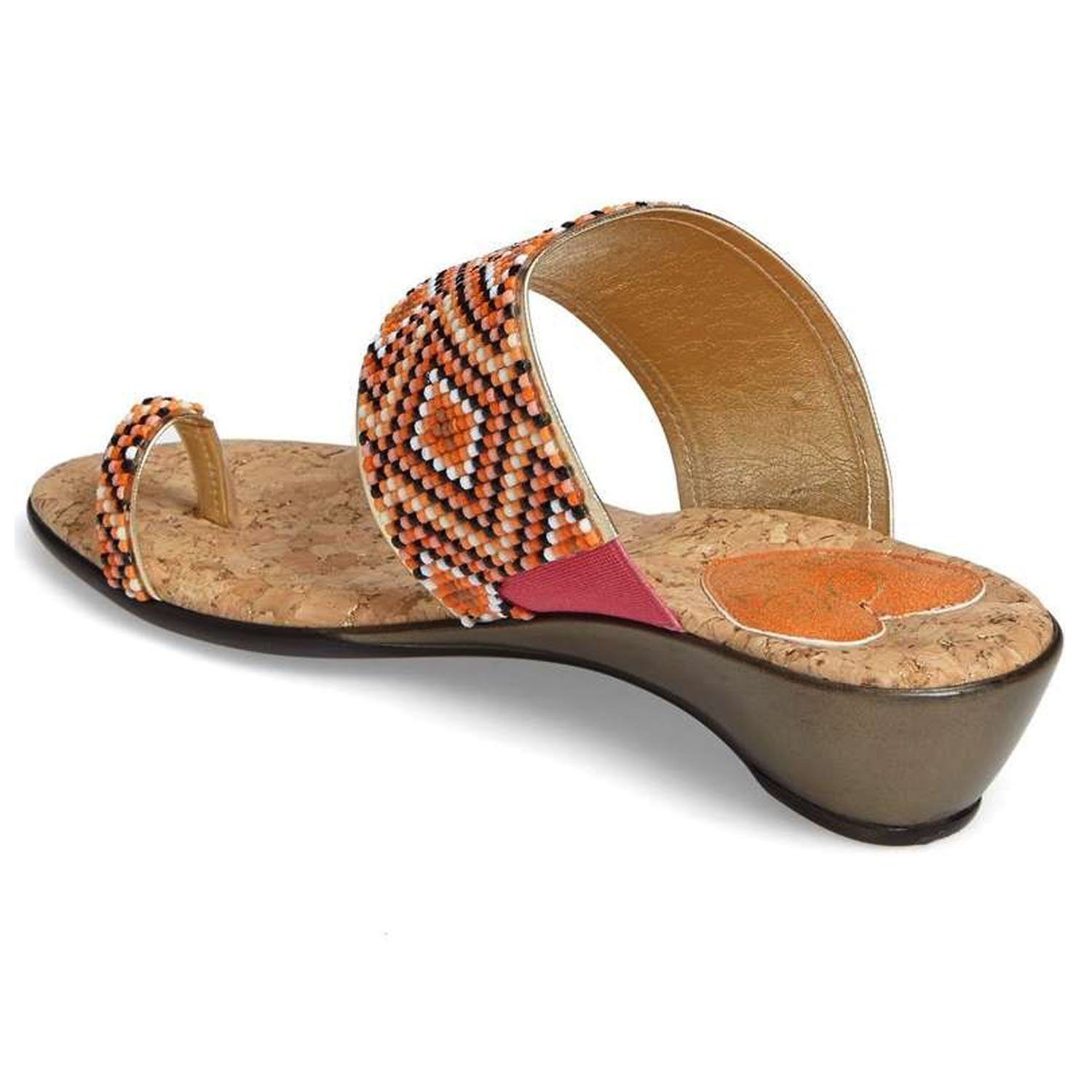 Coastal sandals featuring a diamond patterned leather upper, memory foam padding, and a low wedge outsole, perfect for summer outings.