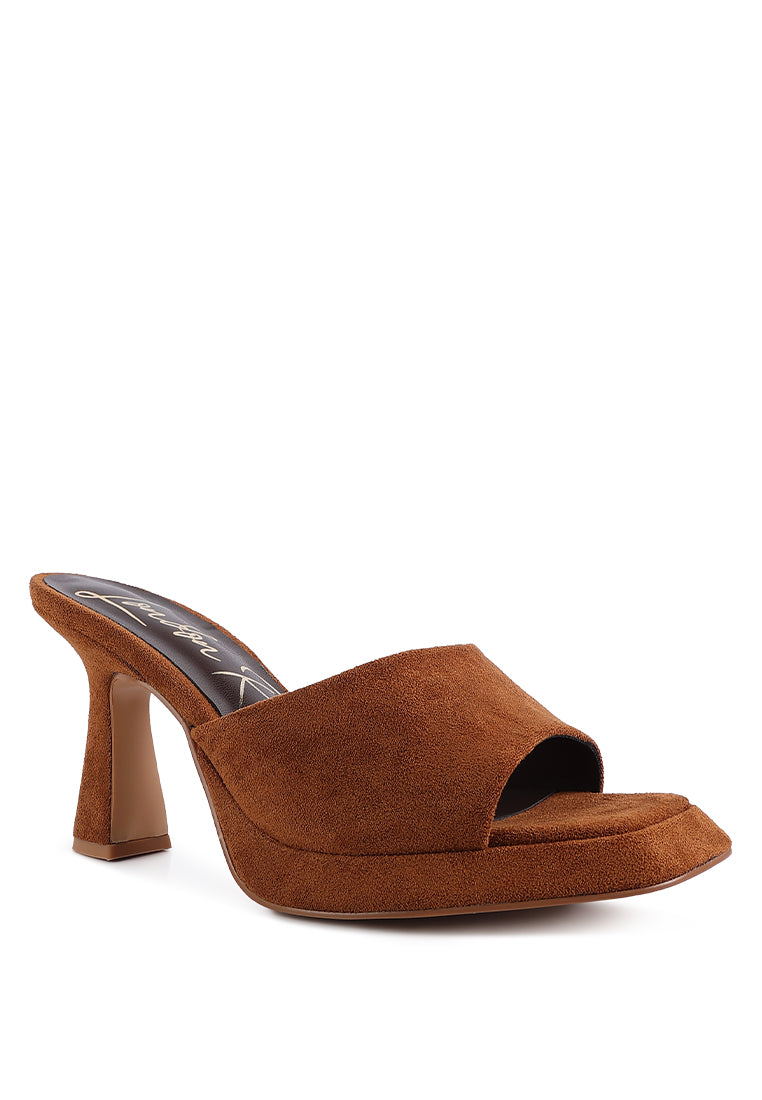 A pair of stylish Copyme Micro Suede Slip On Spool Heel Sandals featuring a soft microfiber upper and mid-high spool heels.