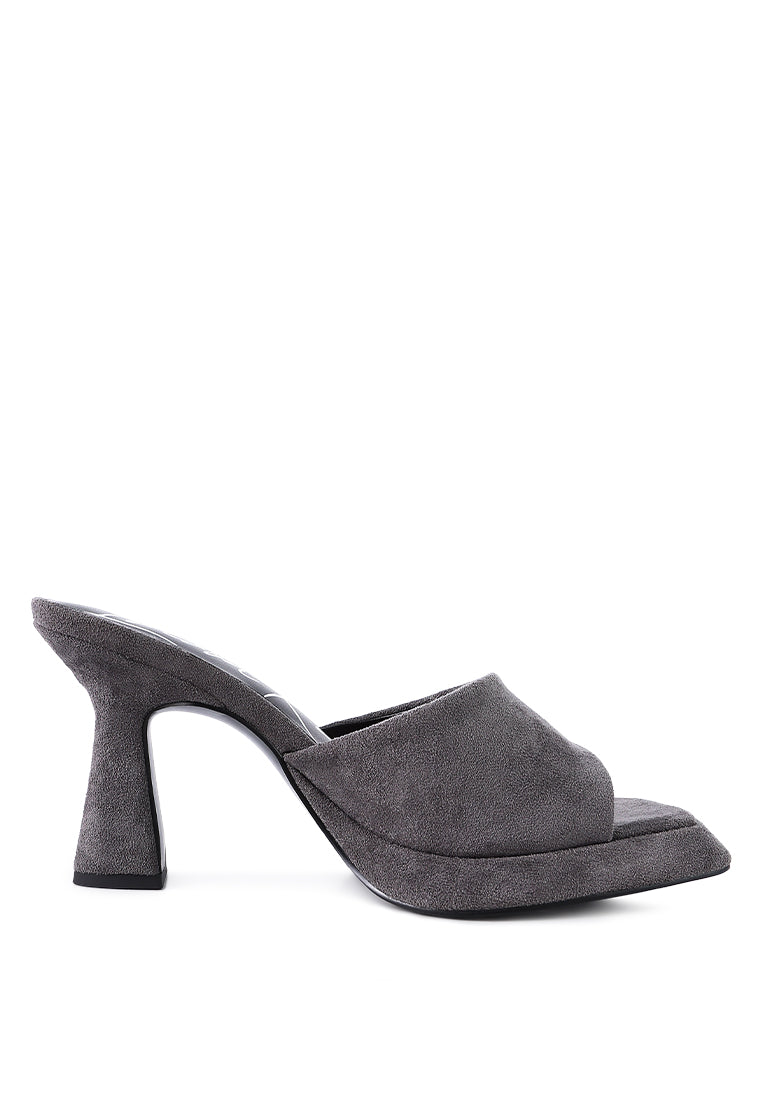 A pair of stylish Copyme Micro Suede Slip On Spool Heel Sandals featuring a soft microfiber upper and mid-high spool heels.