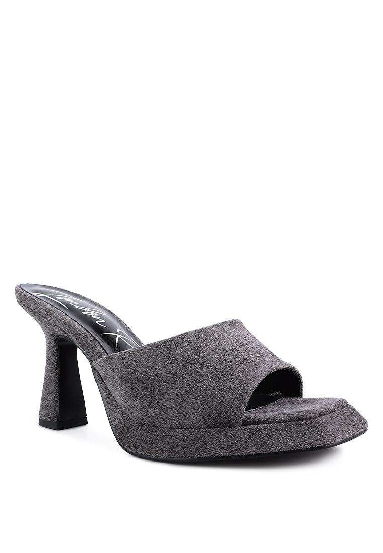 A pair of stylish Copyme Micro Suede Slip On Spool Heel Sandals featuring a soft microfiber upper and mid-high spool heels.