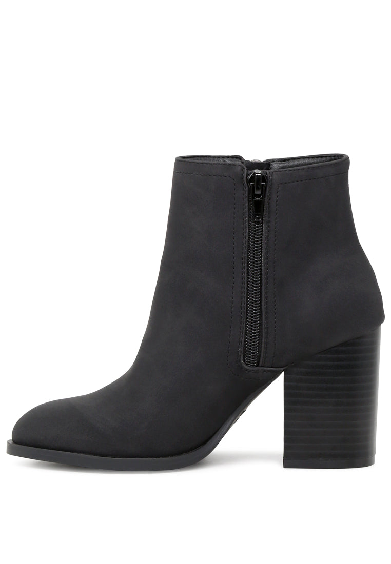 Courtney Stylish High Heel Ankle Boots featuring elegant detailing and a trendy high heel design, perfect for autumn outfits.