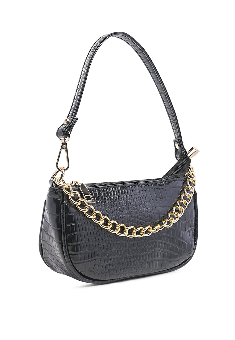 Stylish Croc Sling Bag in shiny faux leather with a detachable strap and zipped compartments, available in various colors.