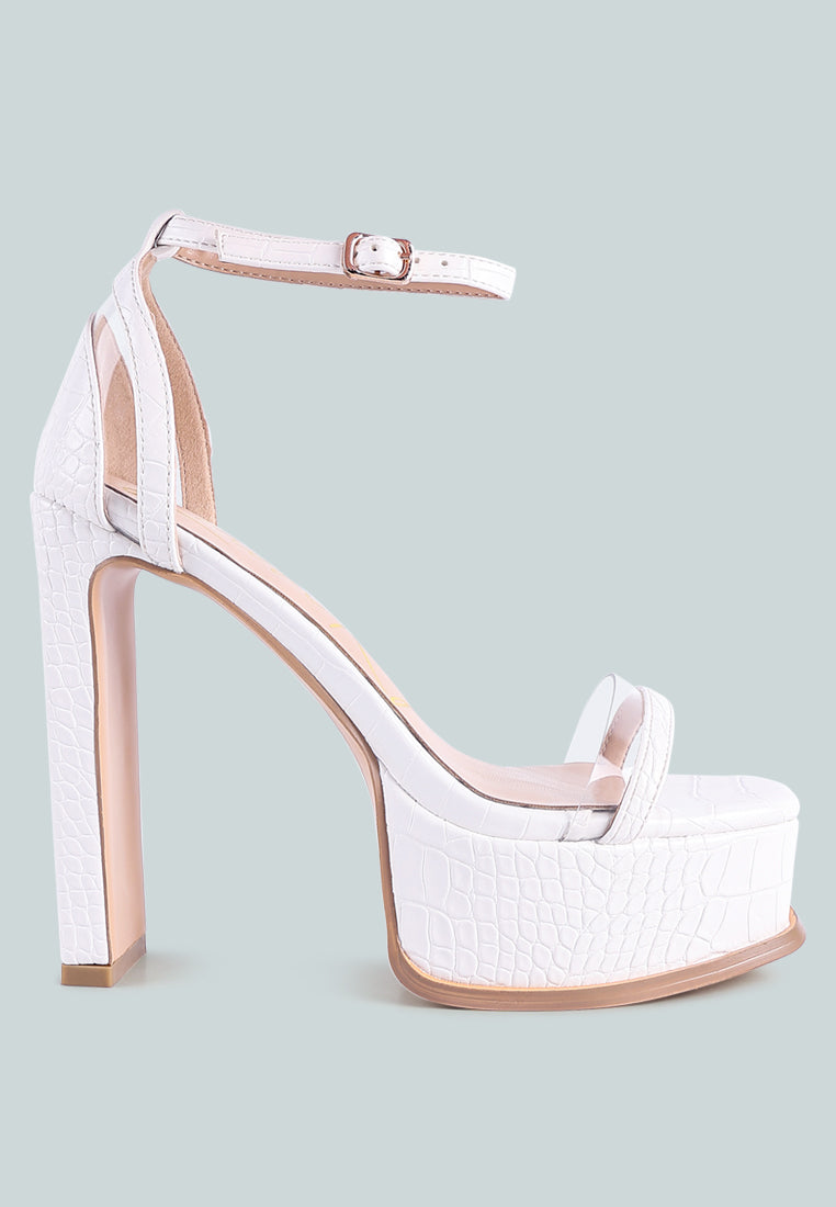 Stylish Cutlass High Heeled Chunky Sandals featuring croc texture, ankle strap, and high slim block heels.