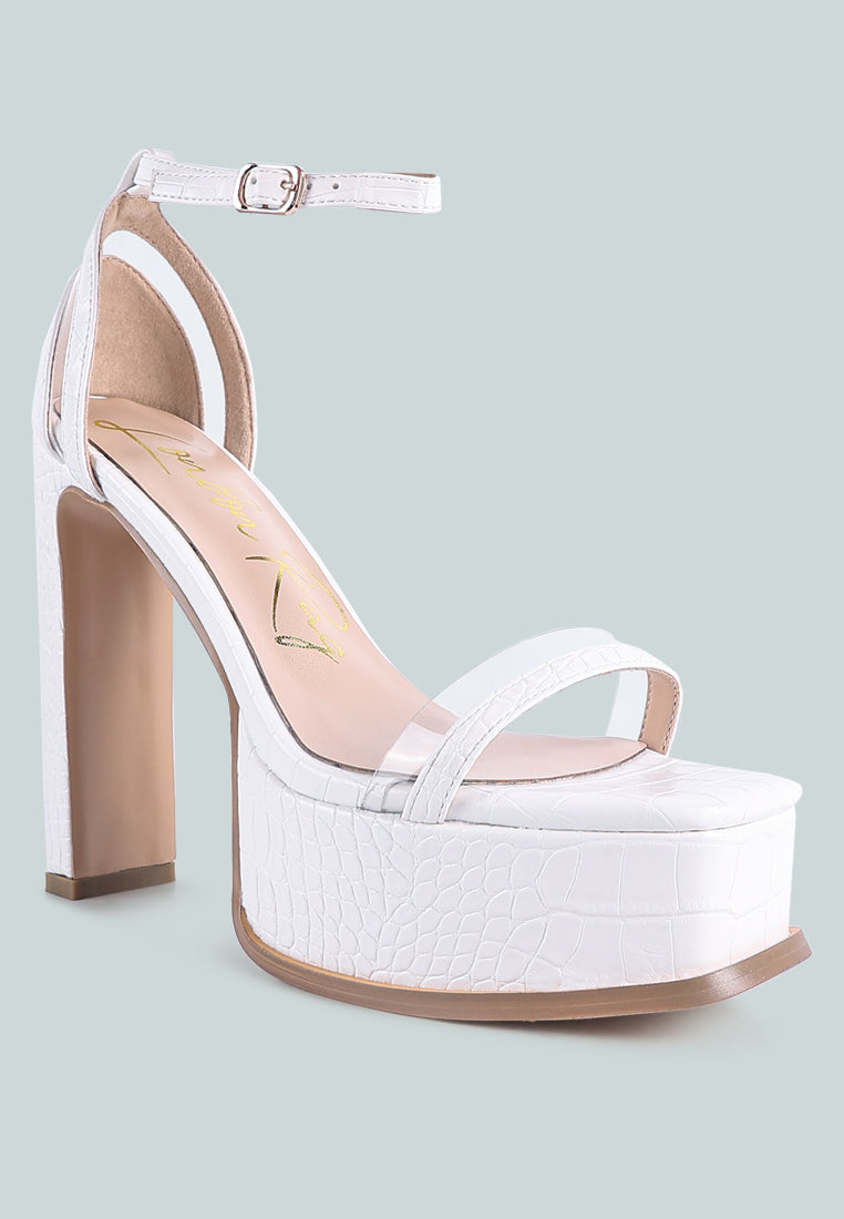 Stylish Cutlass High Heeled Chunky Sandals featuring croc texture, ankle strap, and high slim block heels.