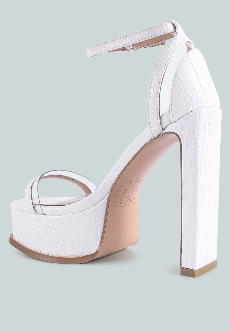 Stylish Cutlass High Heeled Chunky Sandals featuring croc texture, ankle strap, and high slim block heels.