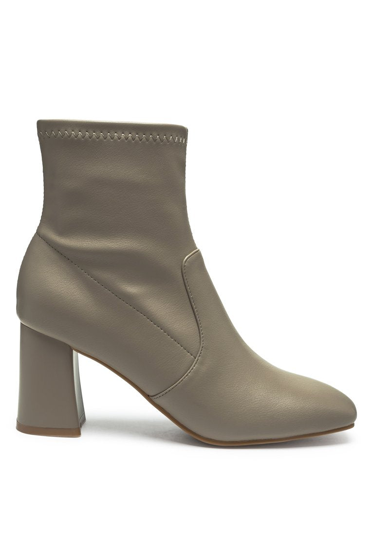 Daffofil Block Heeled Ankle Boots featuring faux leather, side zipper, and block heel design, perfect for winter fashion.