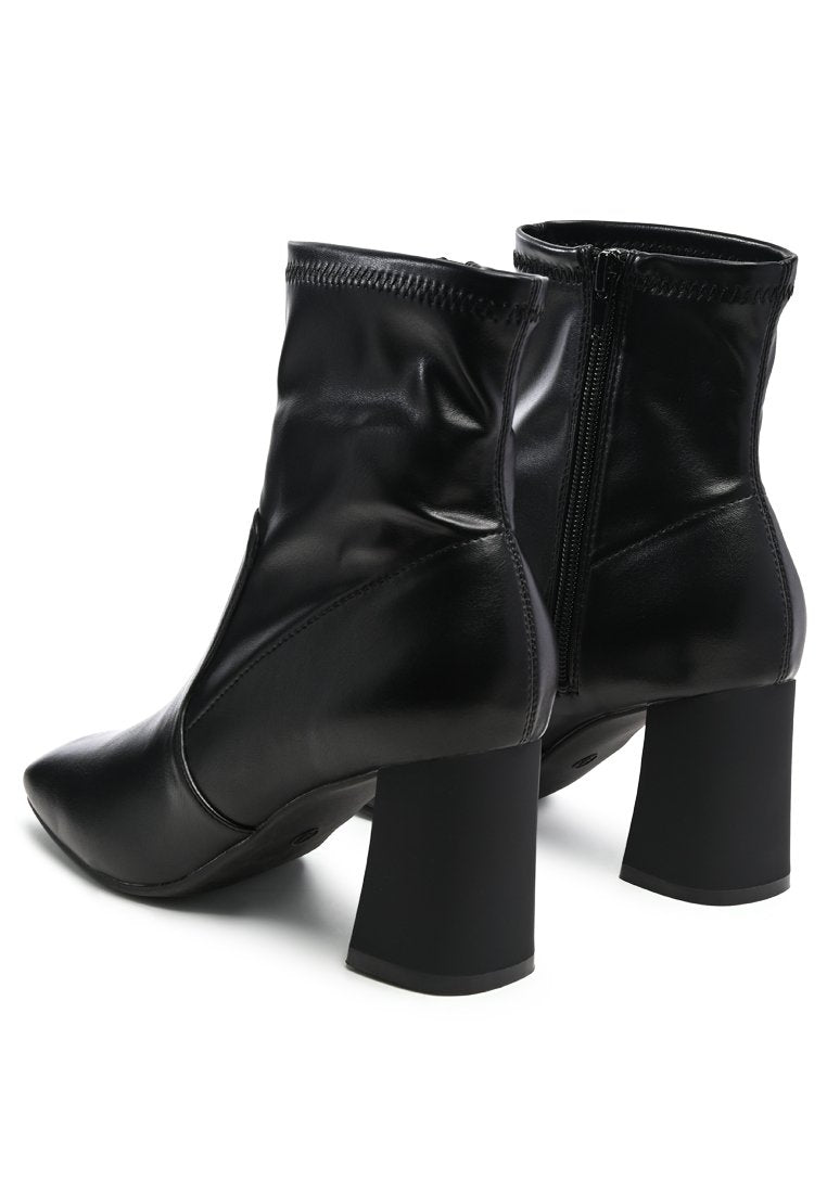 Daffofil Block Heeled Ankle Boots featuring faux leather, side zipper, and block heel design, perfect for winter fashion.