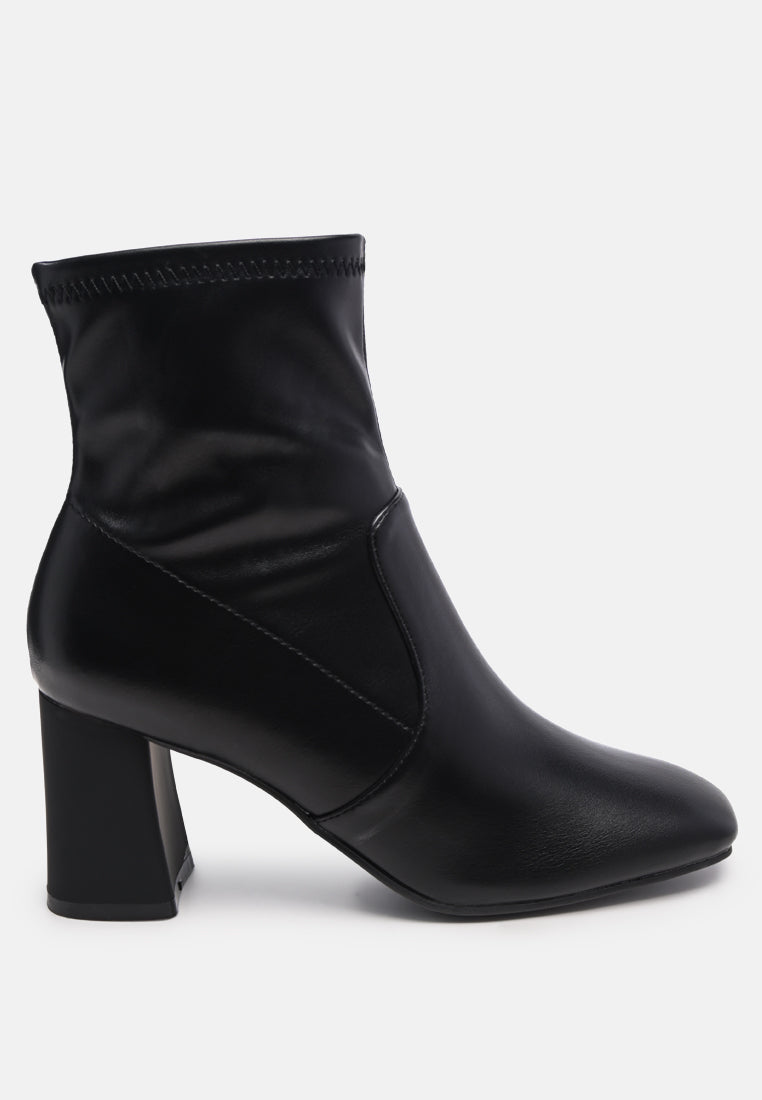 Daffofil Block Heeled Ankle Boots featuring faux leather, side zipper, and block heel design, perfect for winter fashion.