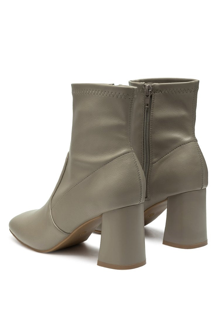 Daffofil Block Heeled Ankle Boots featuring faux leather, side zipper, and block heel design, perfect for winter fashion.