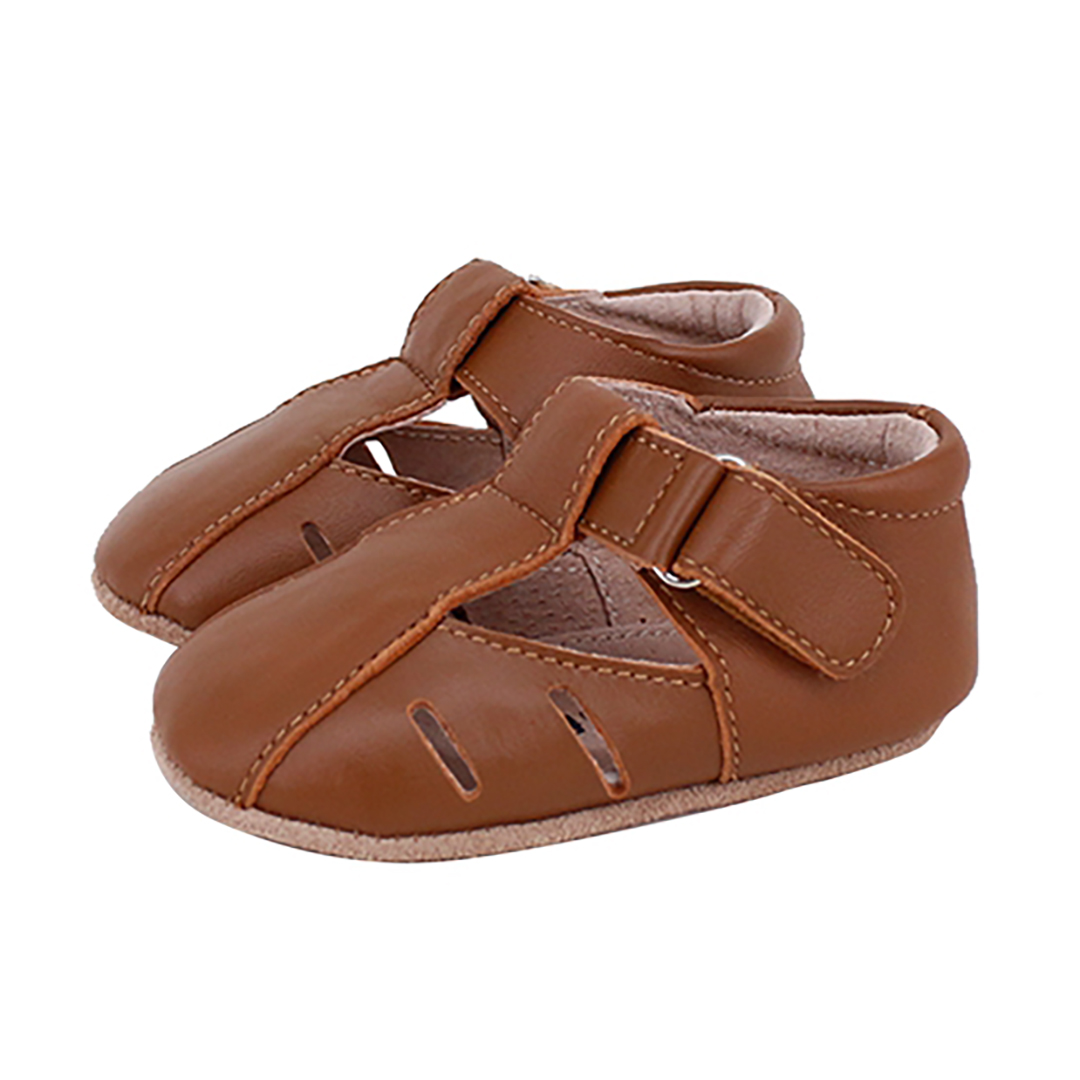 Dakota Baby & Toddler First Walker Shoes in Tan, handcrafted leather with soft suede sole, designed for comfort and support.