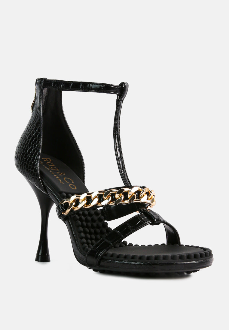 Dakota Metal Chain Mid Heel Sandals featuring a stylish T-strap design with a metal chain detail, available in black, white, and latte colors.