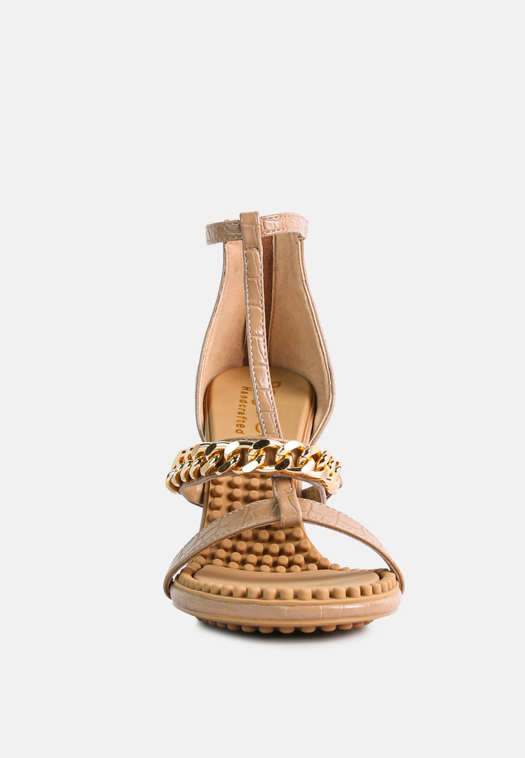 Dakota Metal Chain Mid Heel Sandals featuring a stylish T-strap design with a metal chain detail, available in black, white, and latte colors.