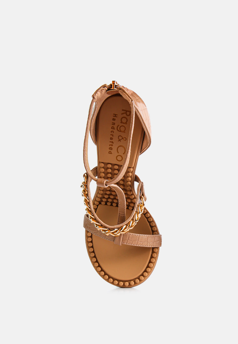 Dakota Metal Chain Mid Heel Sandals featuring a stylish T-strap design with a metal chain detail, available in black, white, and latte colors.