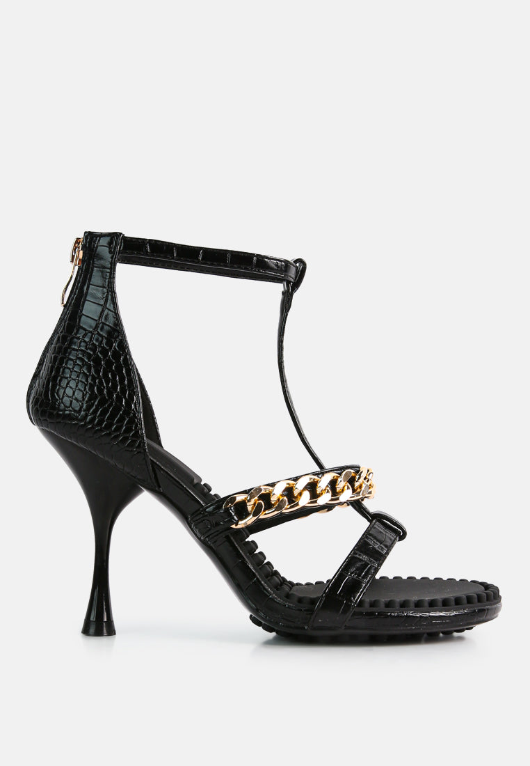 Dakota Metal Chain Mid Heel Sandals featuring a stylish T-strap design with a metal chain detail, available in black, white, and latte colors.