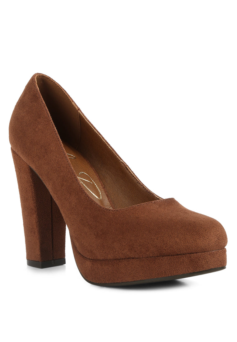 Delia Suede Block Heel Pumps showcasing a classic design with a block heel and cushioned insole, perfect for versatile styling.