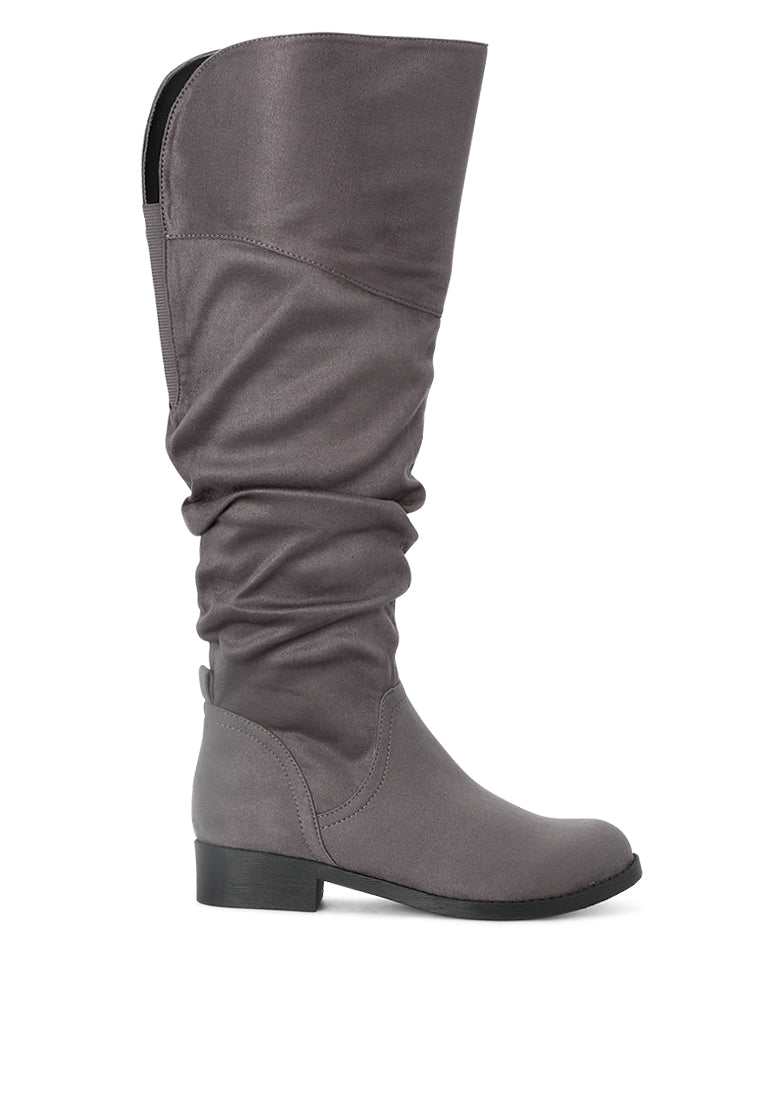 Stylish Dexter Knee High Boots with a sleek design, made from high-quality materials, perfect for various occasions.