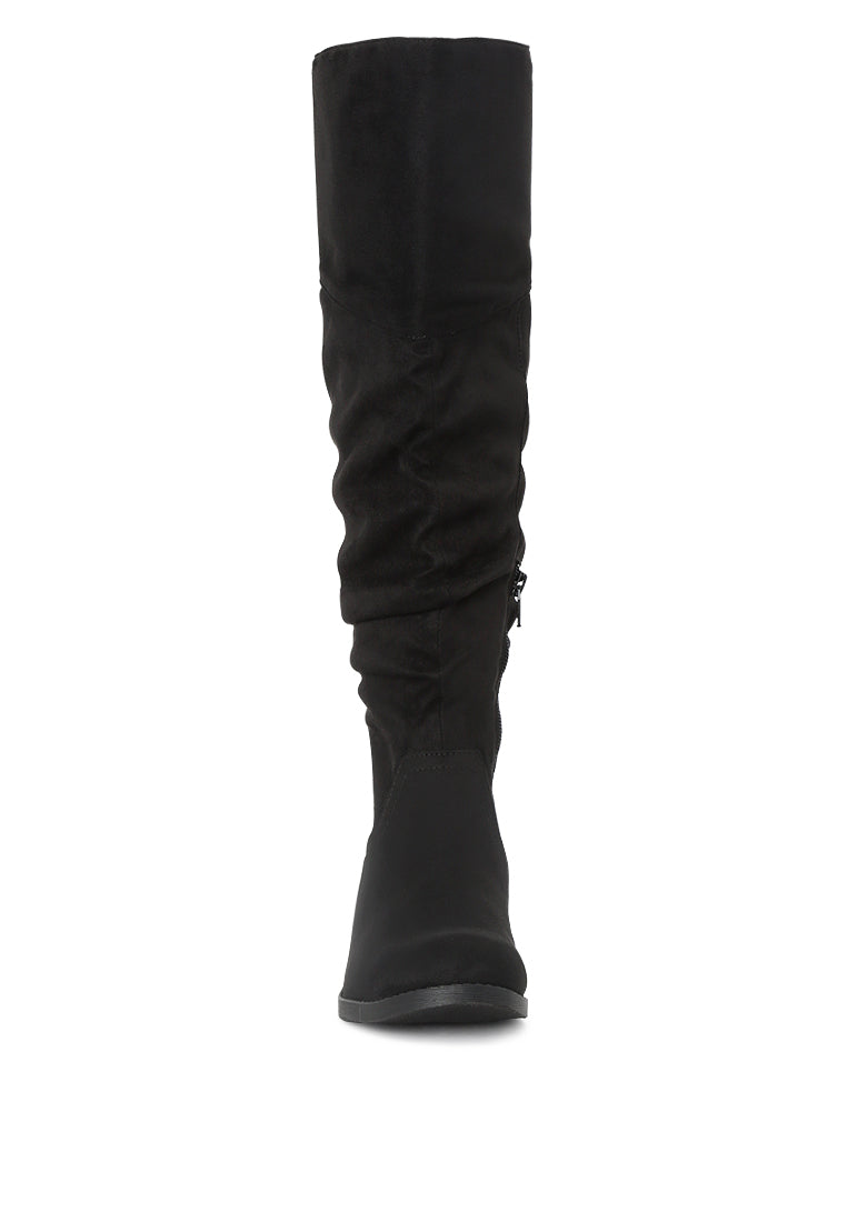 Stylish Dexter Knee High Boots with a sleek design, made from high-quality materials, perfect for various occasions.