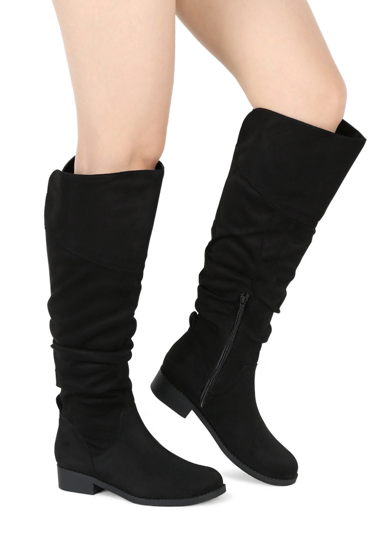 Stylish Dexter Knee High Boots with a sleek design, made from high-quality materials, perfect for various occasions.