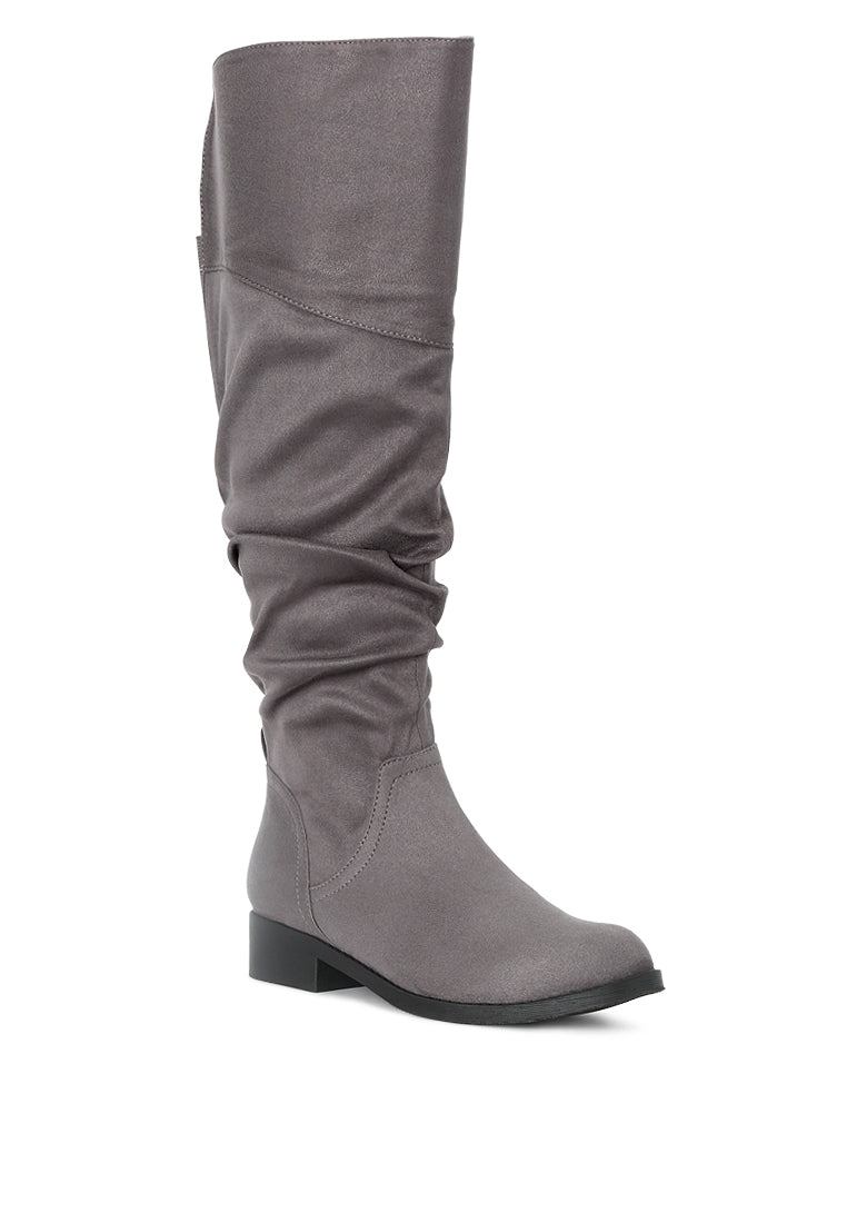 Stylish Dexter Knee High Boots with a sleek design, made from high-quality materials, perfect for various occasions.