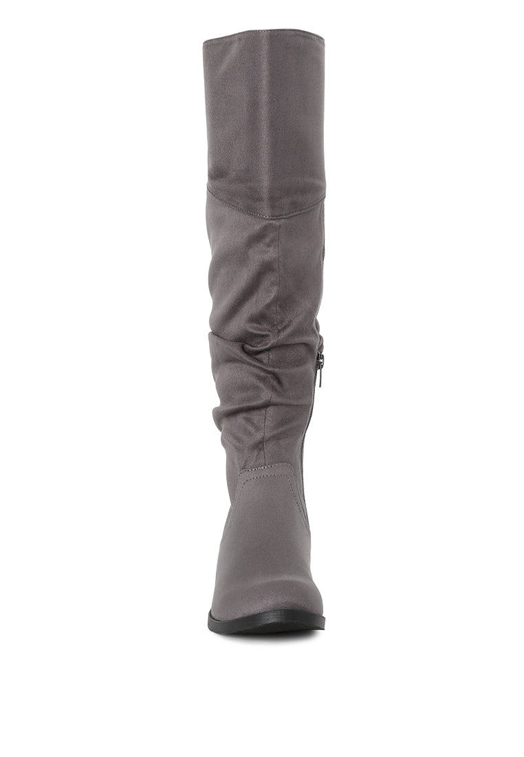 Stylish Dexter Knee High Boots with a sleek design, made from high-quality materials, perfect for various occasions.