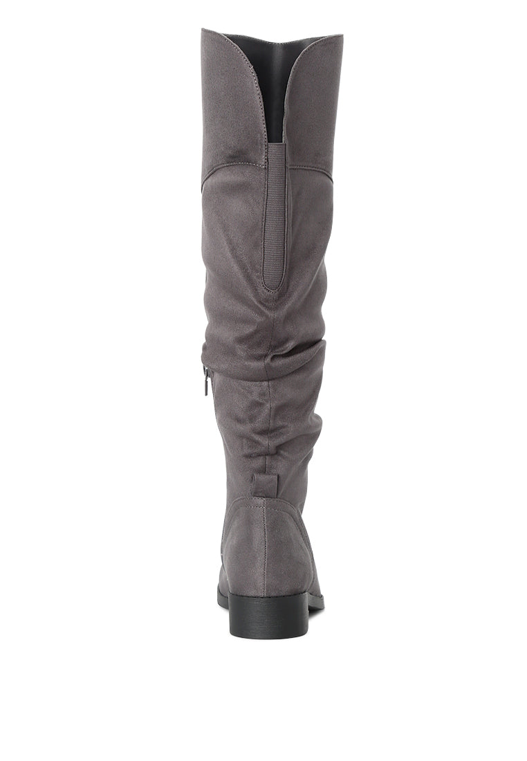 Stylish Dexter Knee High Boots with a sleek design, made from high-quality materials, perfect for various occasions.