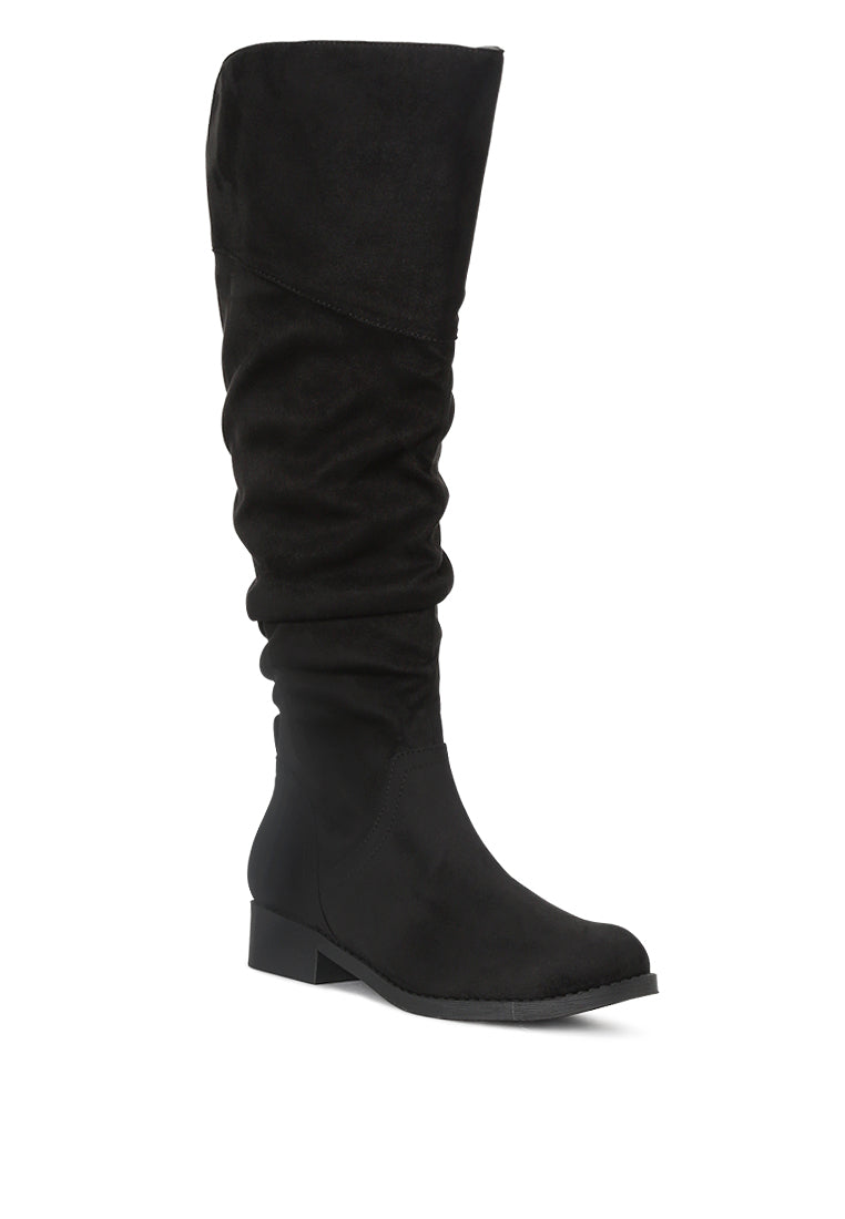 Stylish Dexter Knee High Boots with a sleek design, made from high-quality materials, perfect for various occasions.