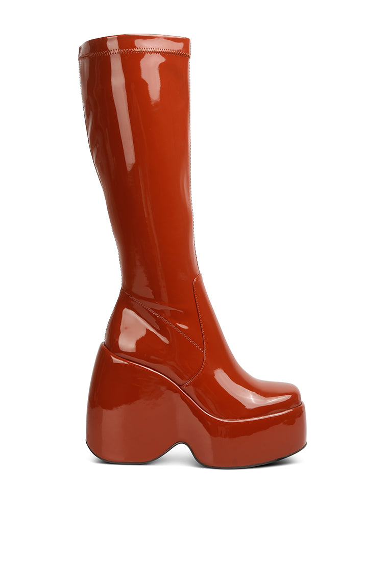 Dirty Dance Patent High Platform Calf Boots featuring a glossy patent finish, high wedge heel, and stylish side zipper detail.