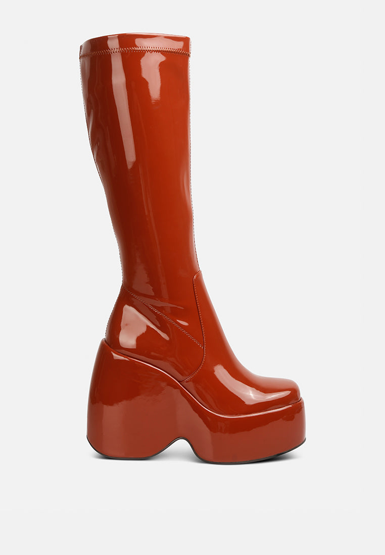 Dirty Dance Patent High Platform Calf Boots featuring a glossy patent finish, high wedge heel, and stylish side zipper detail.