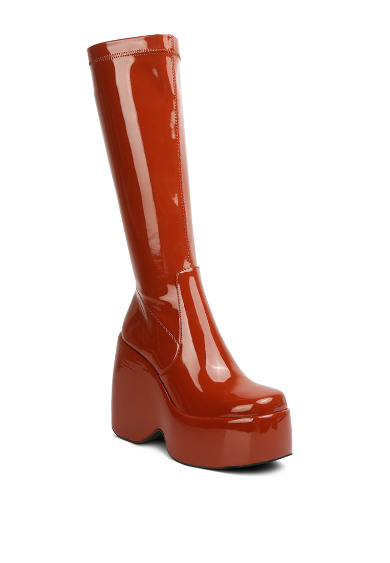 Dirty Dance Patent High Platform Calf Boots featuring a glossy patent finish, high wedge heel, and stylish side zipper detail.