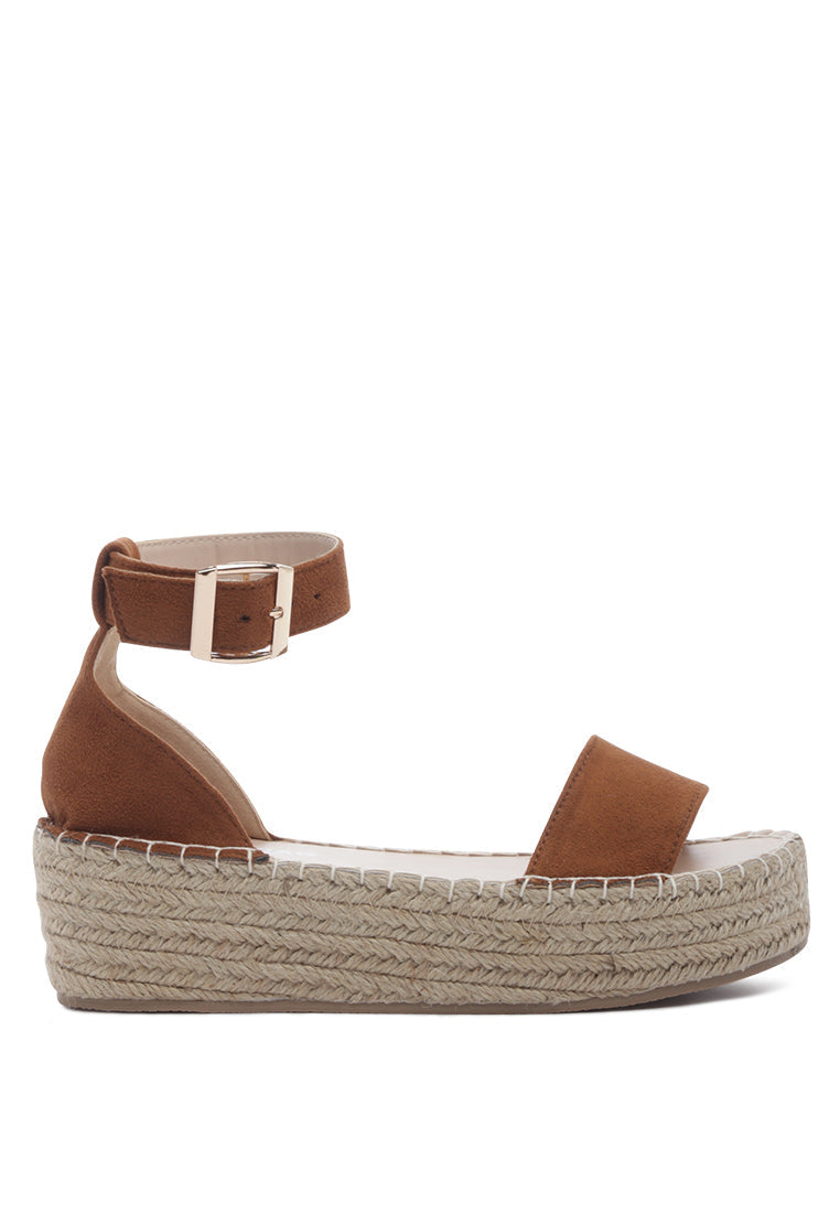 Diyora Braided Espadrilles Sandals featuring a stylish braided jute design and a finished metal buckle closure, perfect for summer wear.