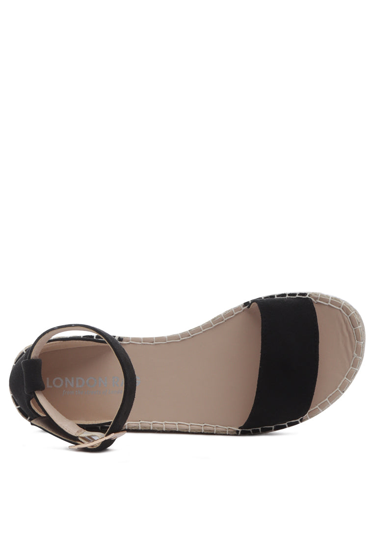 Diyora Braided Espadrilles Sandals featuring a stylish braided jute design and a finished metal buckle closure, perfect for summer wear.