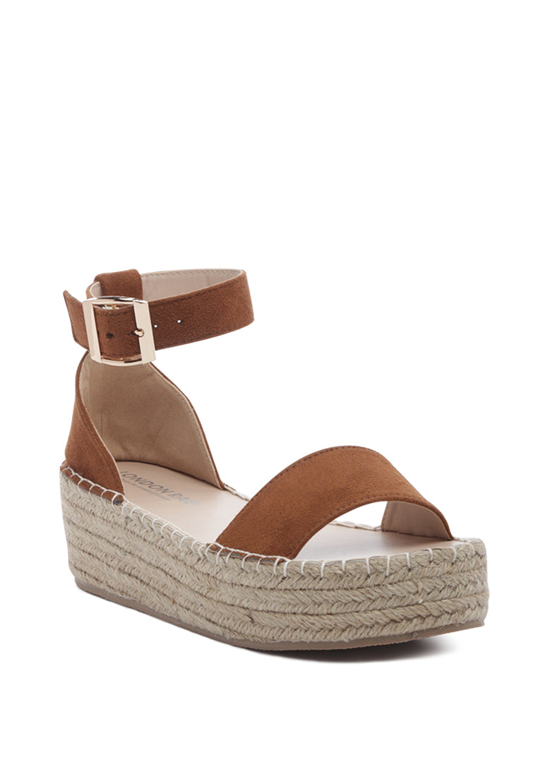 Diyora Braided Espadrilles Sandals featuring a stylish braided jute design and a finished metal buckle closure, perfect for summer wear.