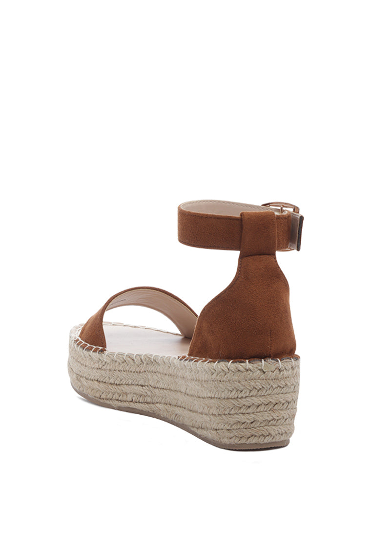 Diyora Braided Espadrilles Sandals featuring a stylish braided jute design and a finished metal buckle closure, perfect for summer wear.