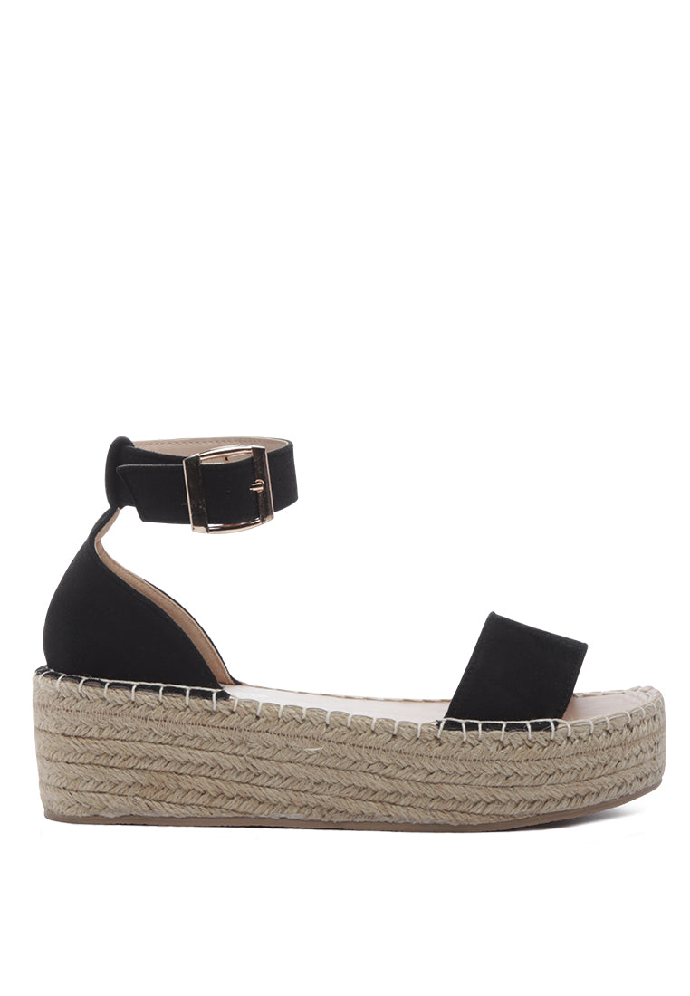 Diyora Braided Espadrilles Sandals featuring a stylish braided jute design and a finished metal buckle closure, perfect for summer wear.