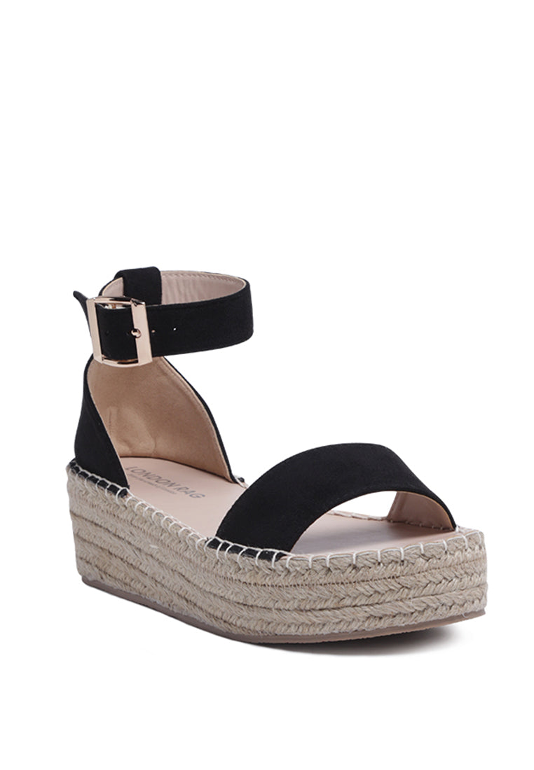 Diyora Braided Espadrilles Sandals featuring a stylish braided jute design and a finished metal buckle closure, perfect for summer wear.