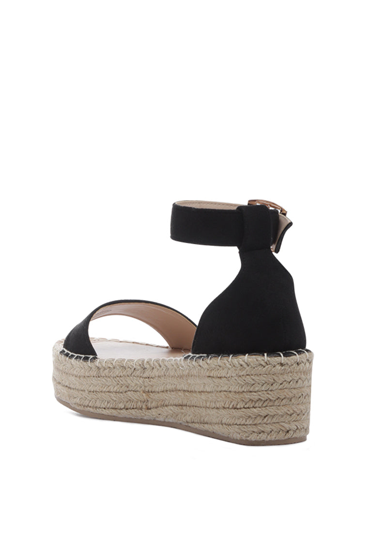 Diyora Braided Espadrilles Sandals featuring a stylish braided jute design and a finished metal buckle closure, perfect for summer wear.