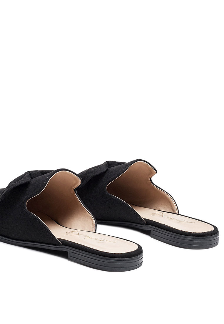 Dobos Casual Walking Bow Mules featuring a stylish bow design, faux suede upper, and closed toe for comfort and elegance.