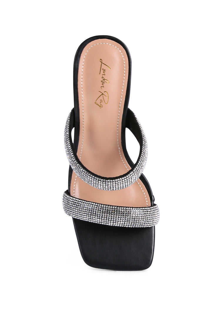 Dolls Rhinestone Embellished Slip On Sandals featuring clear heels and sparkling rhinestone straps, perfect for weddings and parties.