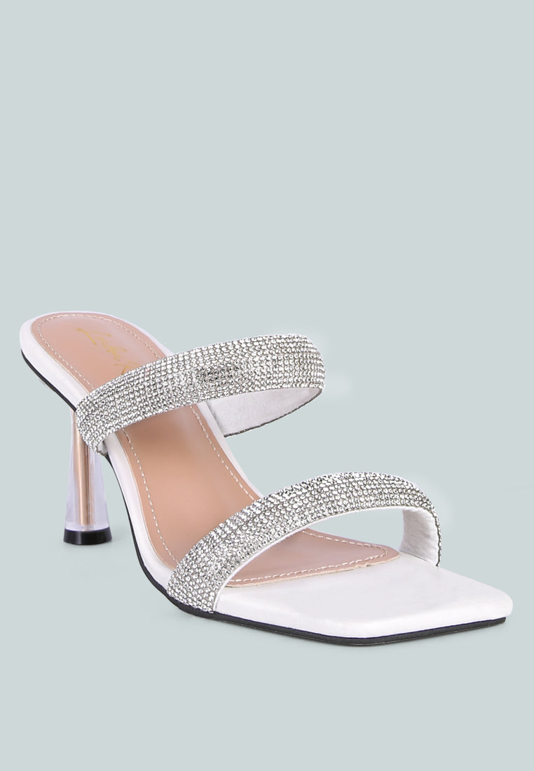 Dolls Rhinestone Embellished Slip On Sandals featuring clear heels and sparkling rhinestone straps, perfect for weddings and parties.