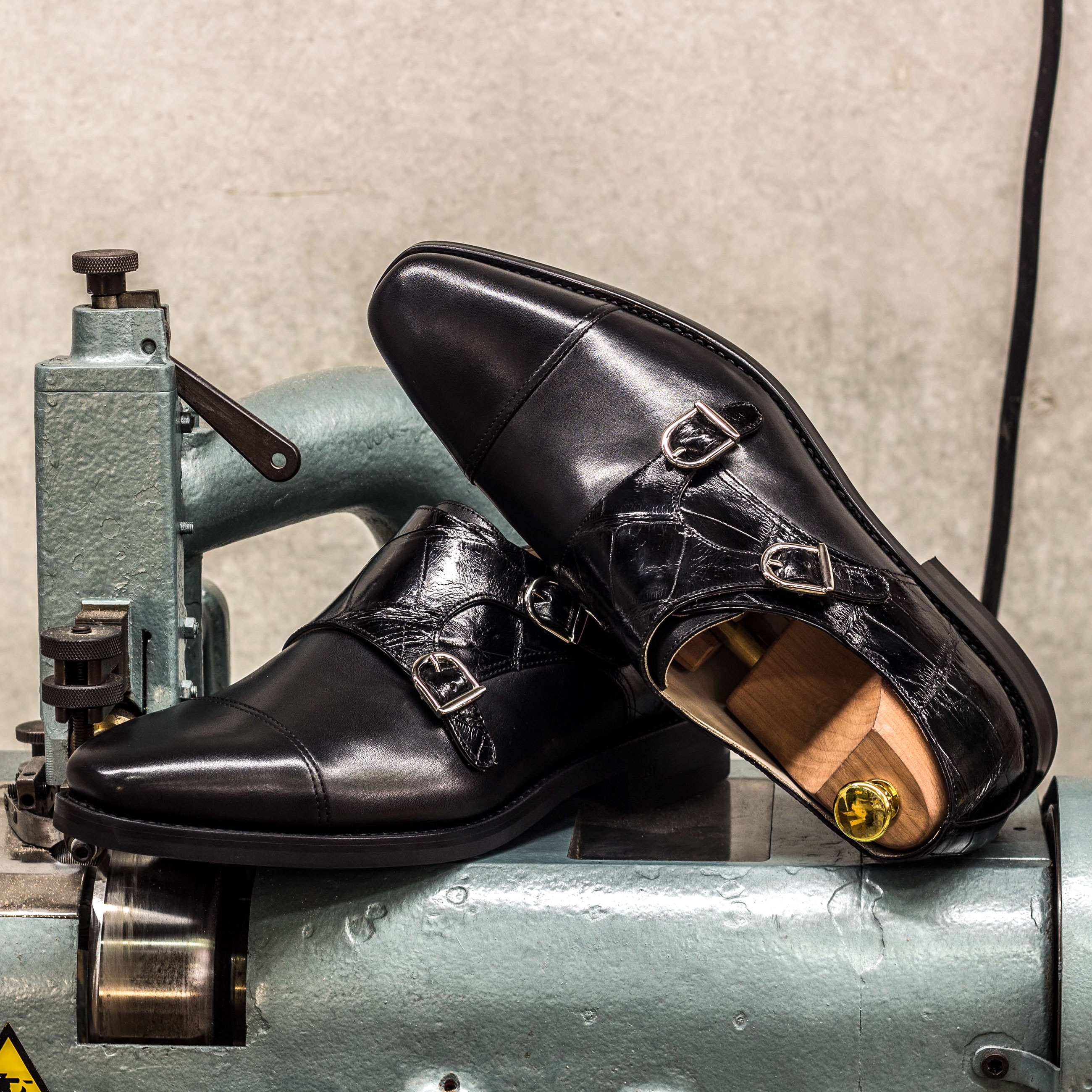 Dulla Alligator Double Monk II shoe featuring black alligator leather and double monk strap design, showcasing elegance and luxury.